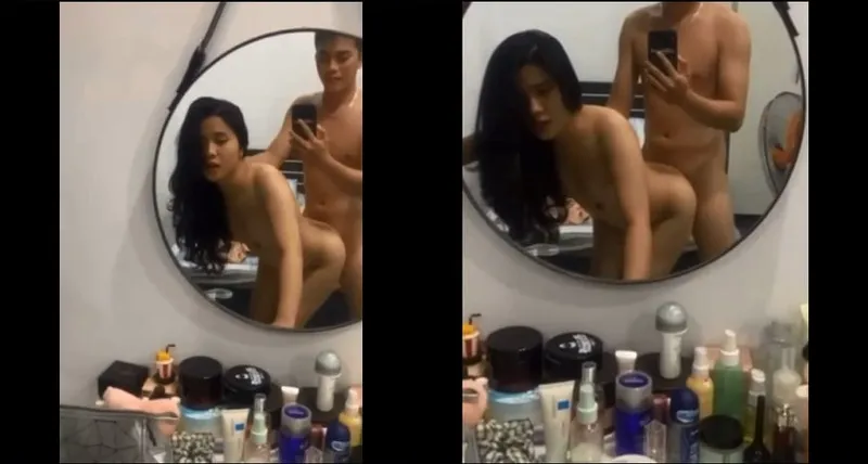 Phang em học sinh xinh như hoa trước gương